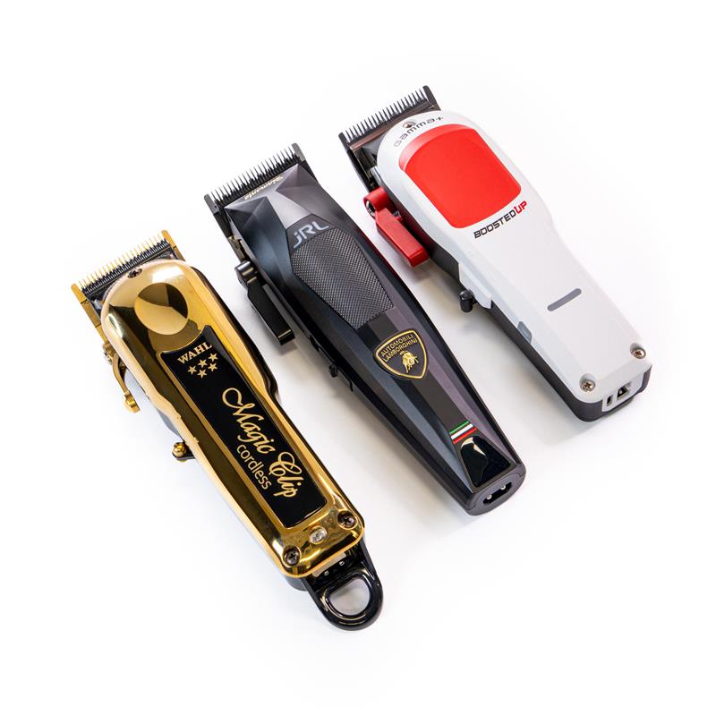 Three hair clippers on a white background