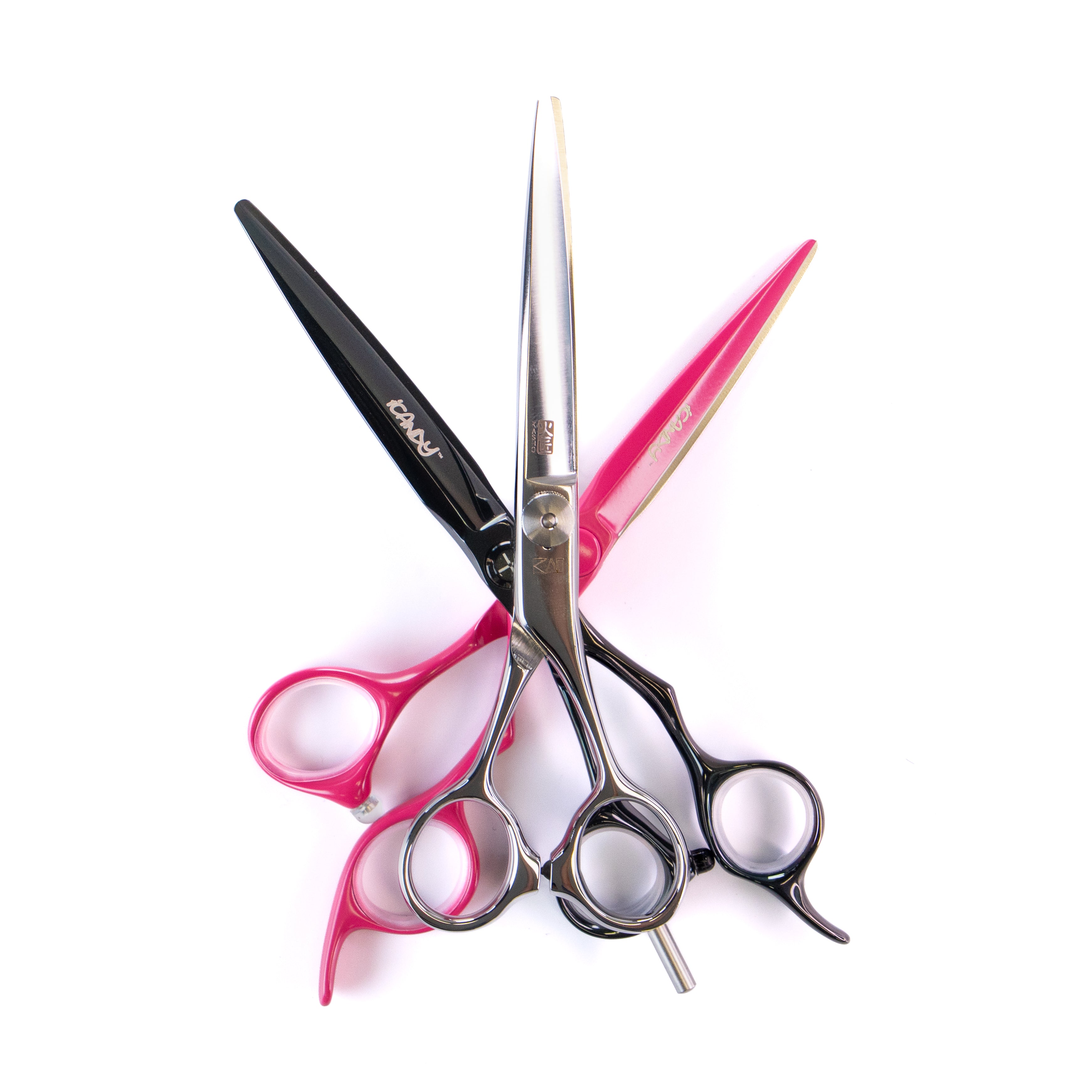 Set of barber shears in multiple colours on a white background