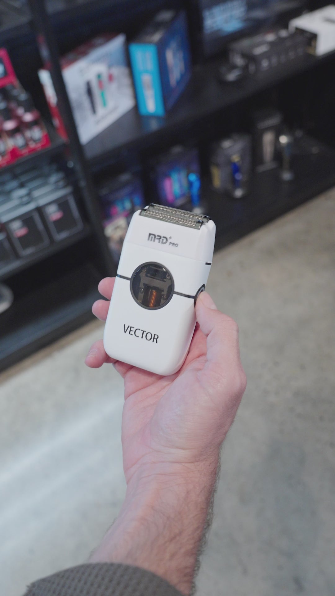 Load video: MRD Pro Vector Foil Shaver - White